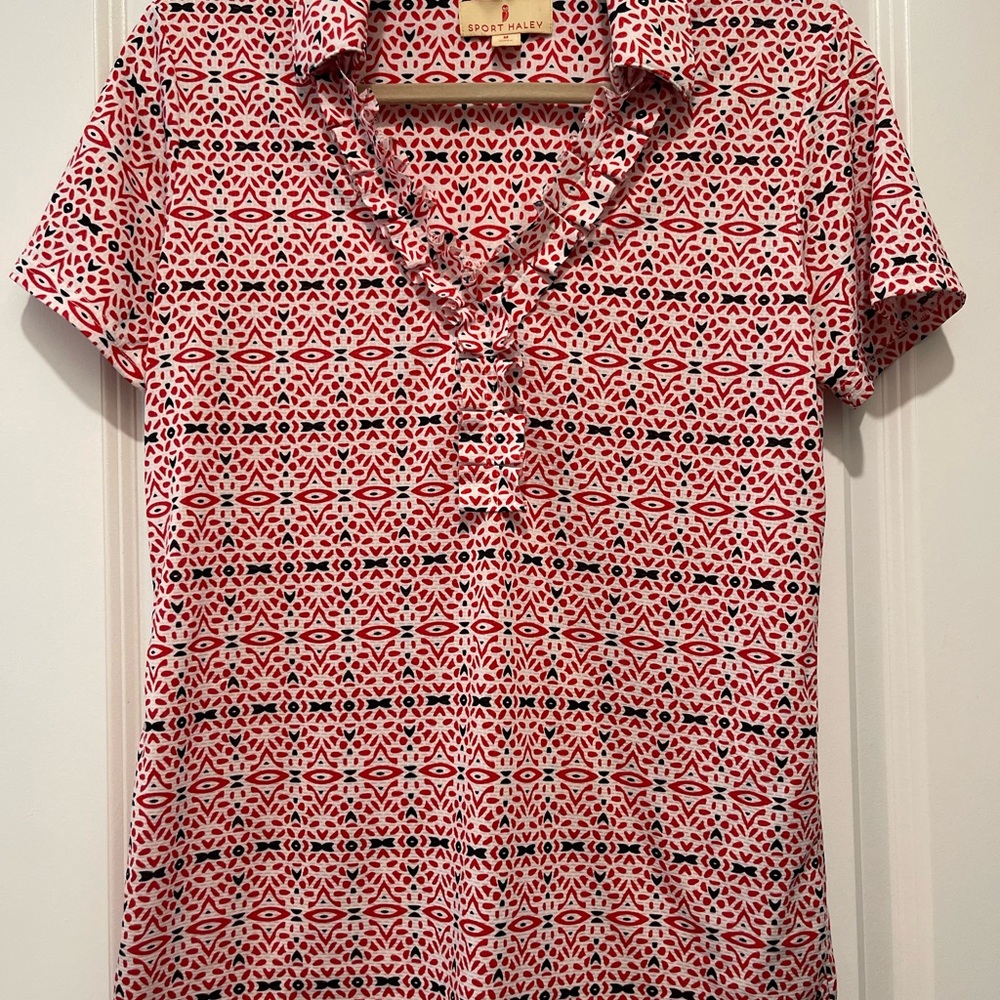 red and white patterned design Sport Haley short sleeve women’s shirt size M.